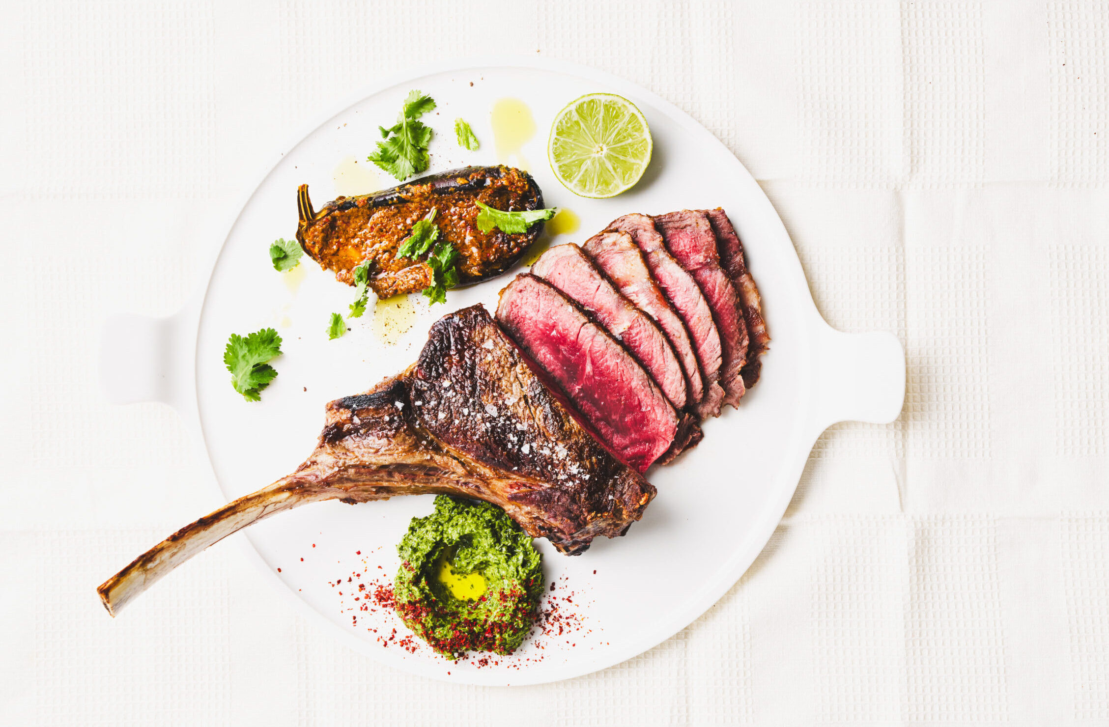 Nature's Fresh tomahawk with spicy eggplant and zhoug - Nature's Fresh